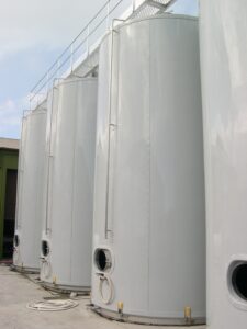 COMPOSITE THERMACLAD insulation cladding fitted around stainless steel tanks.