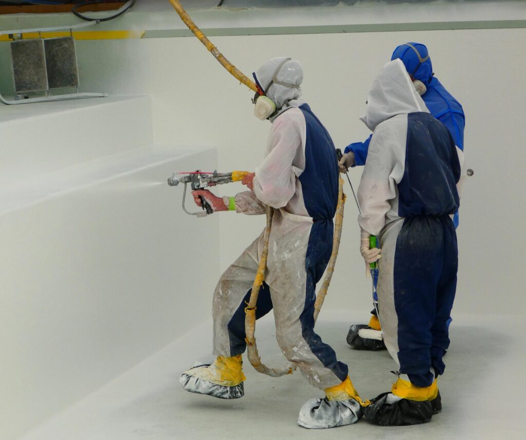 The Composite Group technicians applying fibreglass manufacturing processes in the Christchurch factory