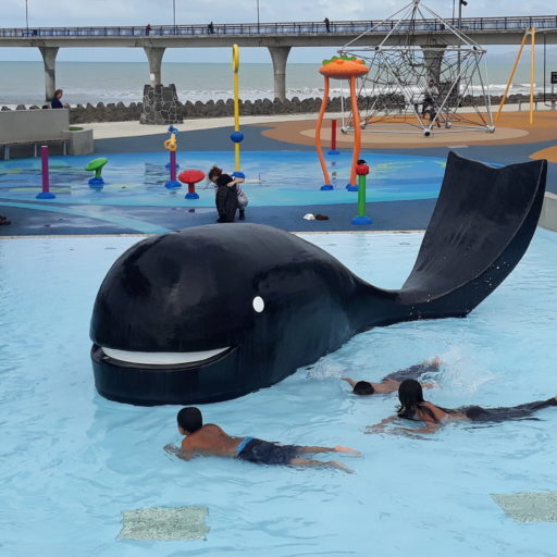 Replacement concrete whale feature created in fibreglass for the New Brighton outdoor playground pool