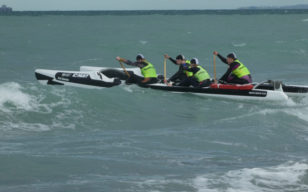 The CSP Twin Hull Canoe in the surf