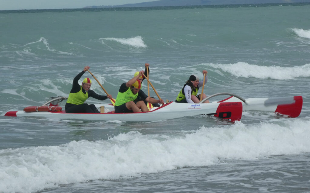 The CSP Twin Hull Canoe in the surf