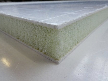 Foam core fibreglass panel sandwiched between smooth, gloss white exterior gelcoat fibreglass sheets.